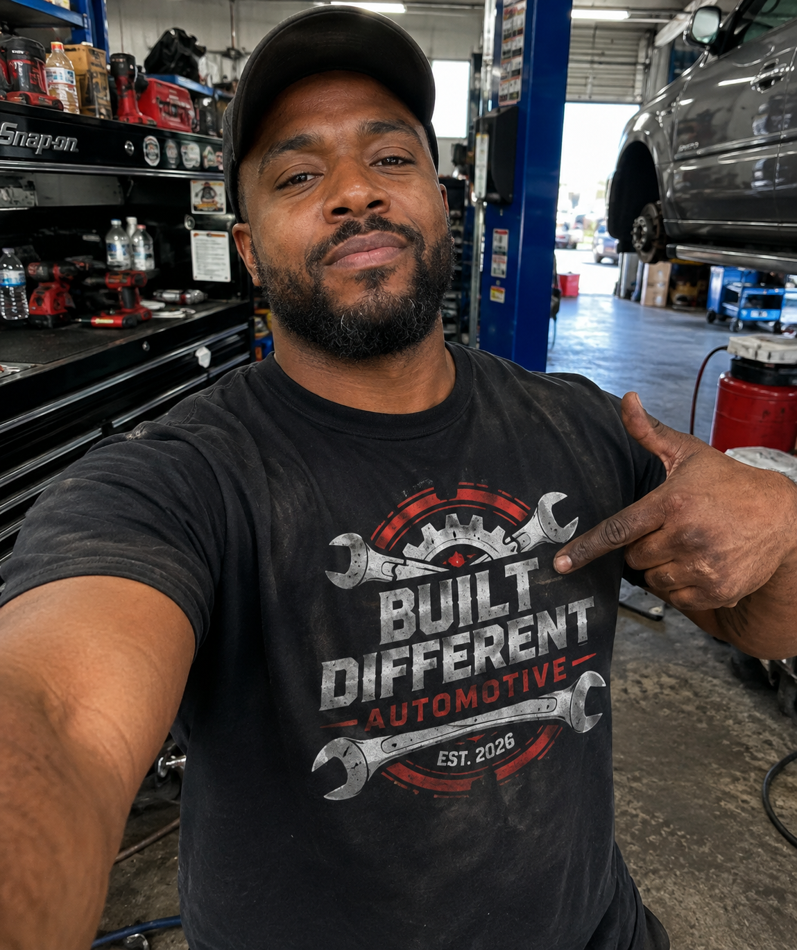 Mechanic wearing his custom automotive printed shirt